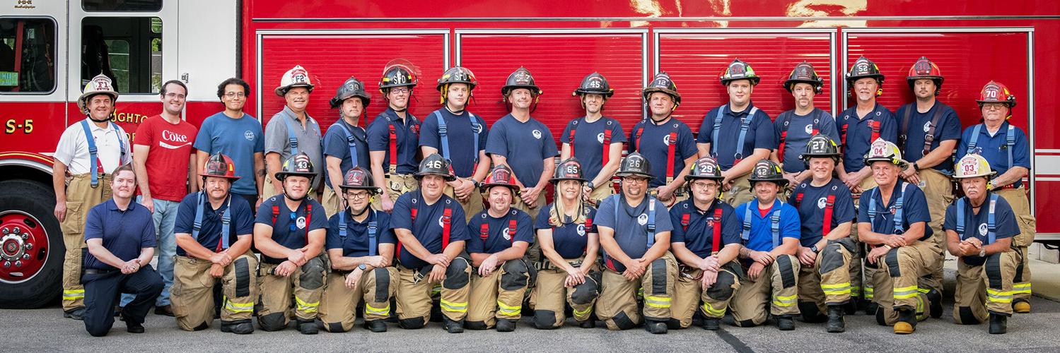 Stoughton firefighters standing together in uniform